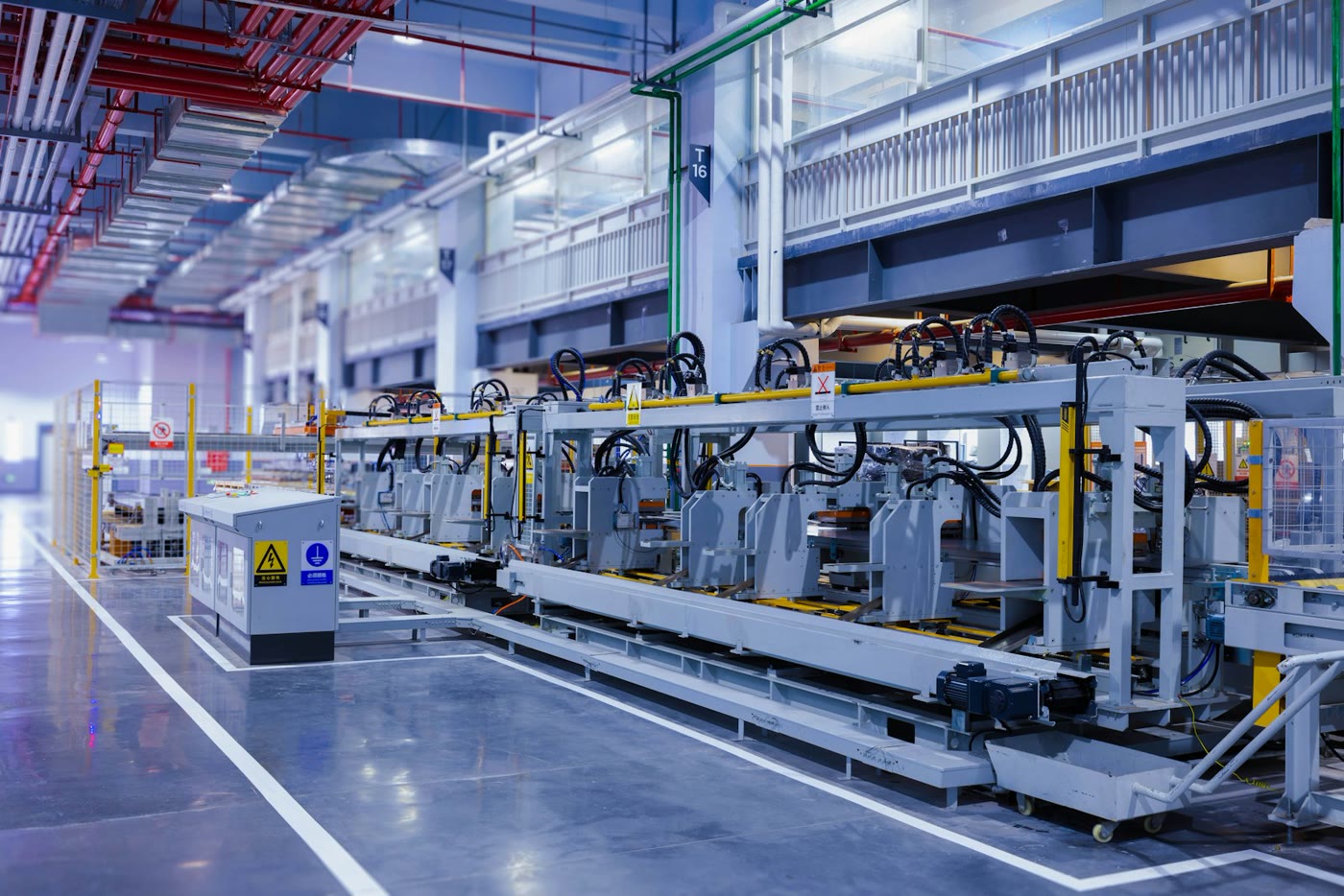 Modern industrial plant floor with production machinery